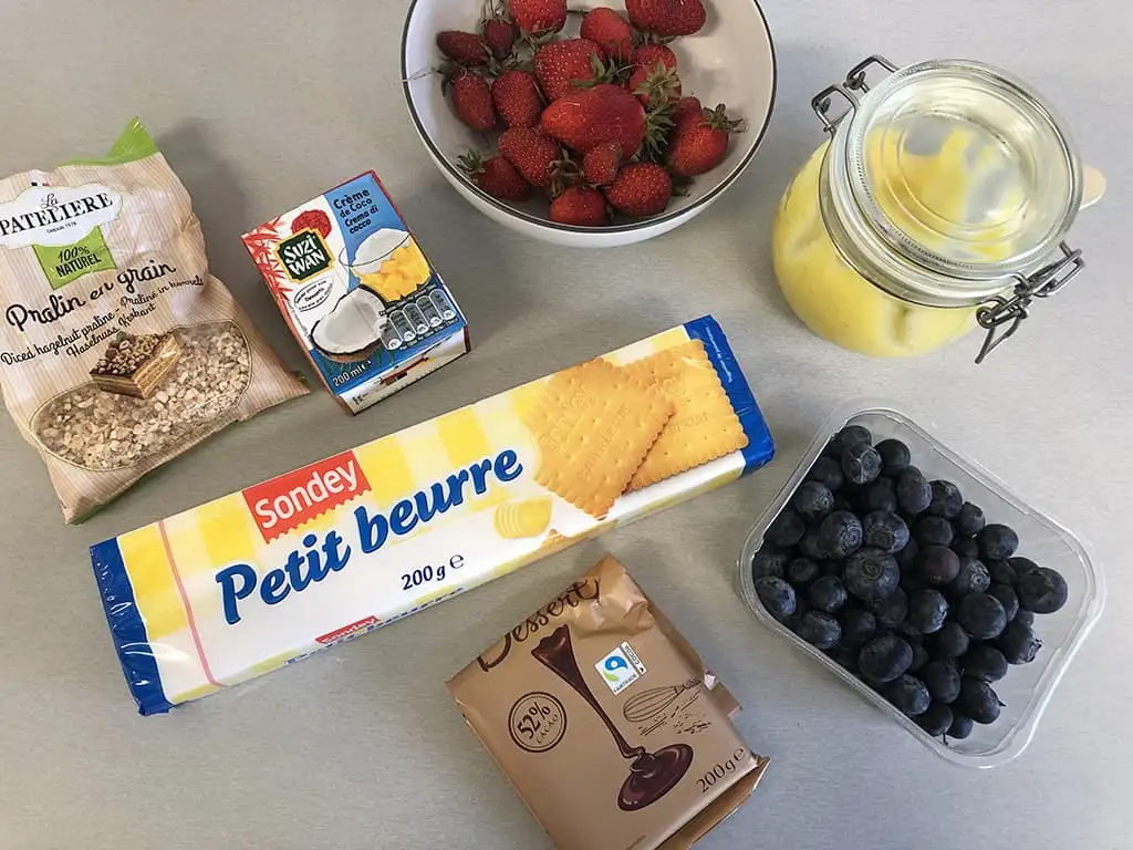 Lime, coconut and strawberry dessert ingredients