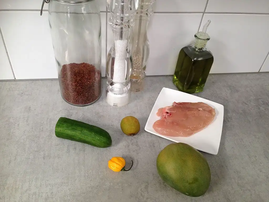 Spicy red rice salad with chicken and mango ingredients