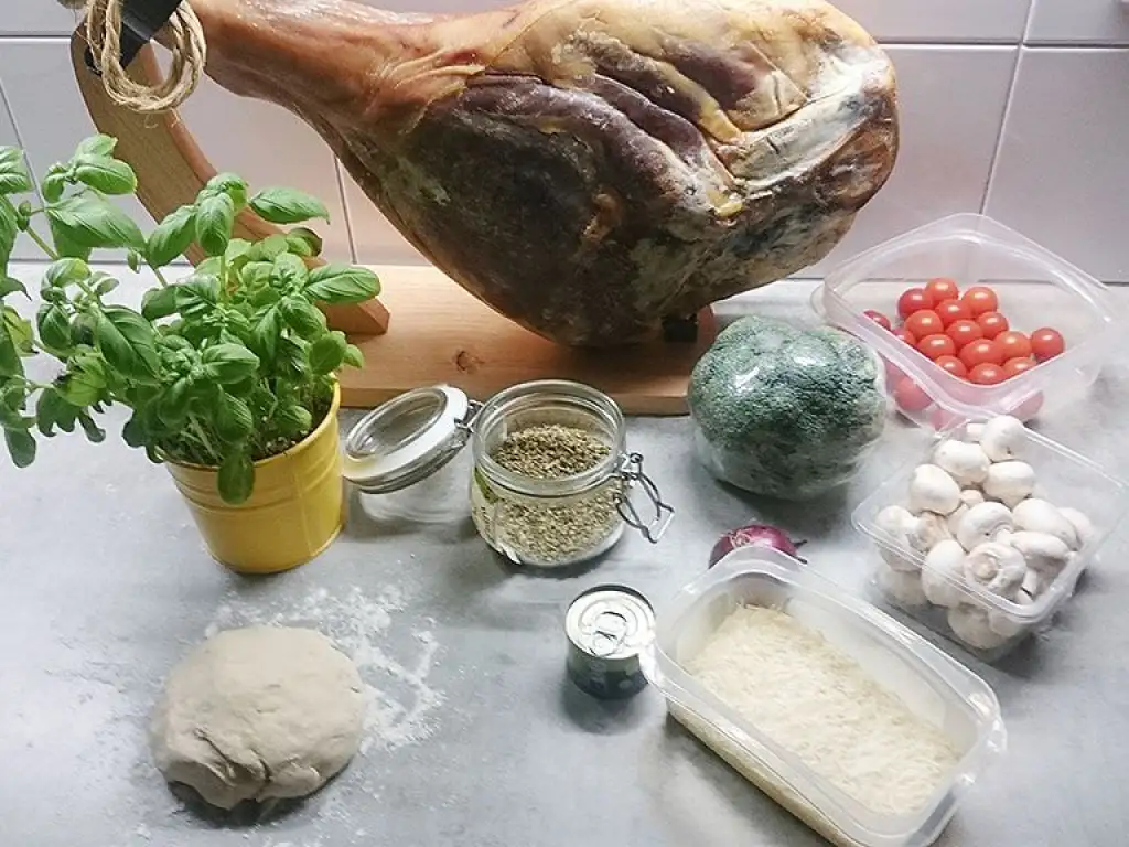 Serrano ham broccoli and basil pizza ingredients