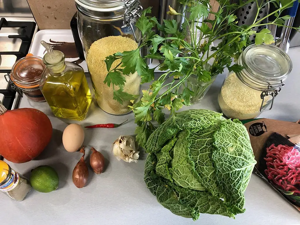 Spicy couscous with meatballs and pumpkin ingredients