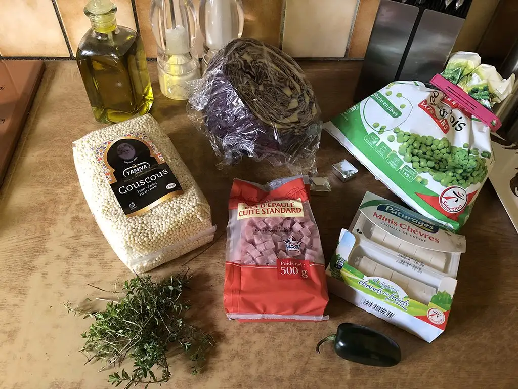 Red cabbage bowl with pearl couscous and goat's cheese ingredients