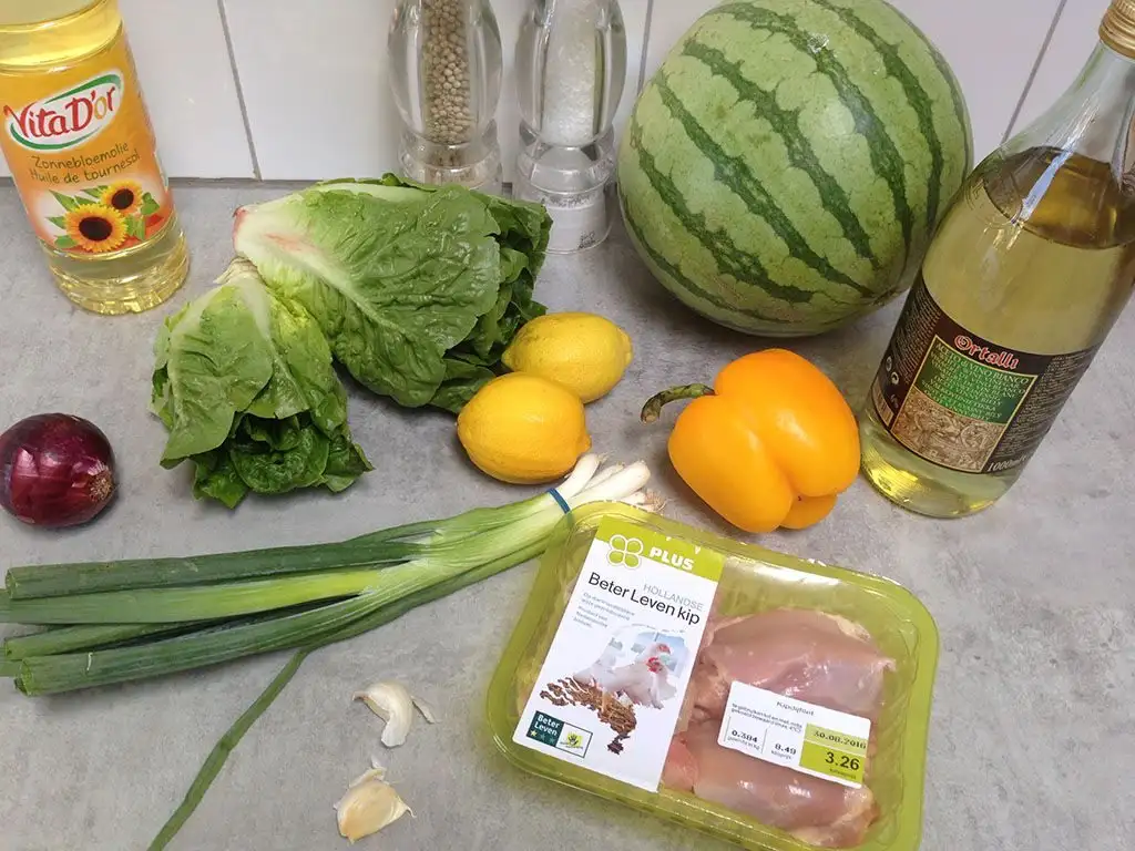 Salad with marinated chicken thighs and watermelon ingredients