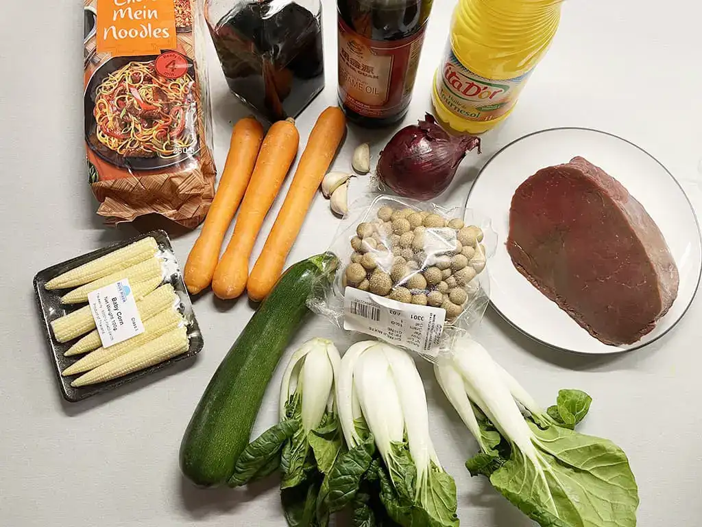Steak strips with noodles and vegetables ingredients