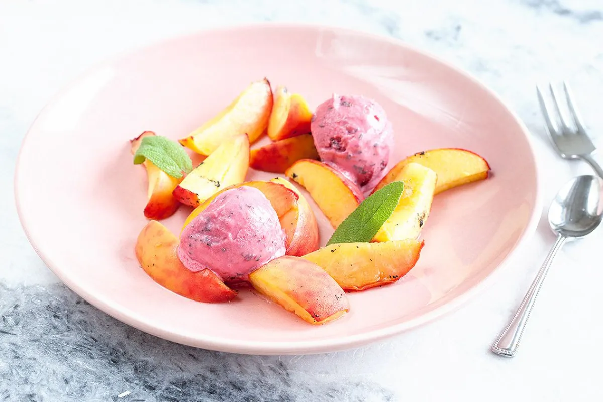 Sage ice cream with oven-roasted peaches
