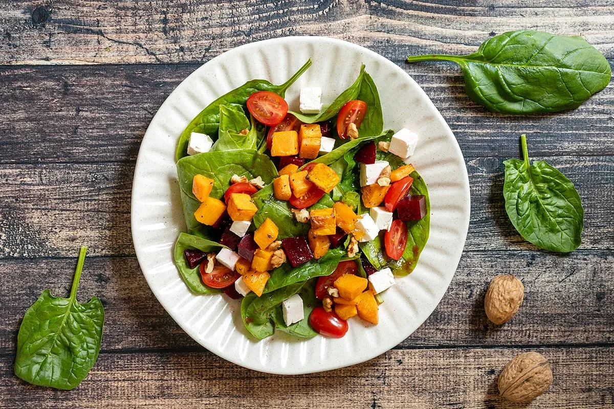Spinach and sweet potato salad – served with red beets and feta