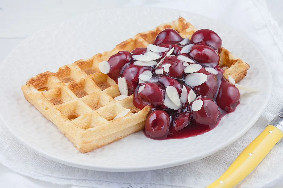 Waffles and warm cherries