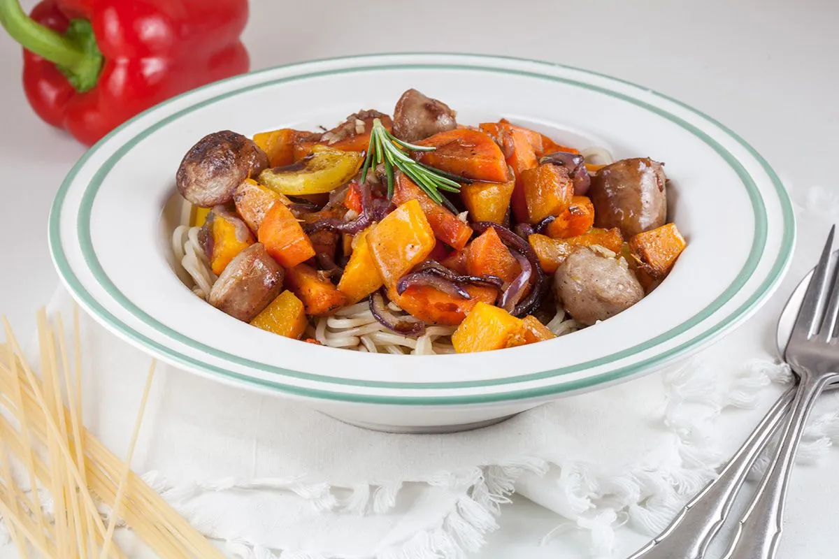 Pasta with oven-baked vegetables and sausage