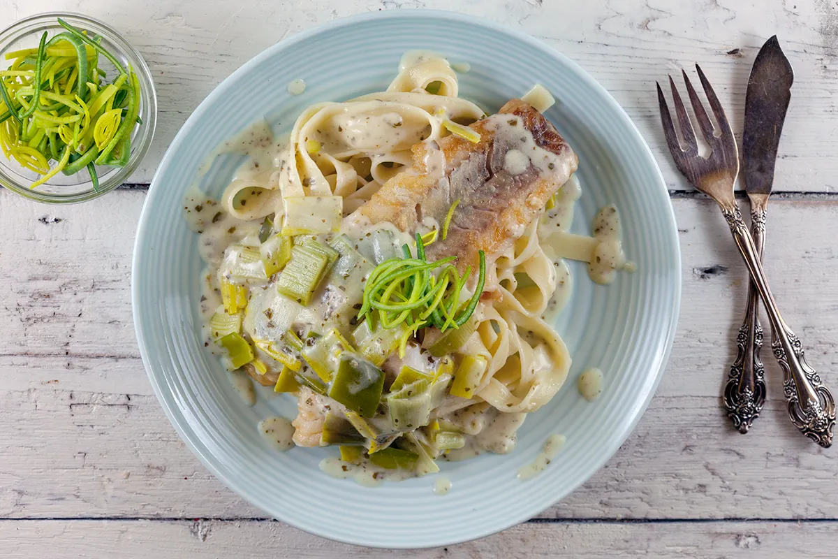 Tagliatelle with creamy pesto leeks and cod