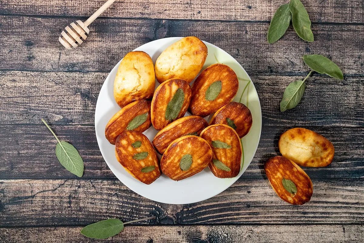 Savory madeleines with goat cheese, honey and sage