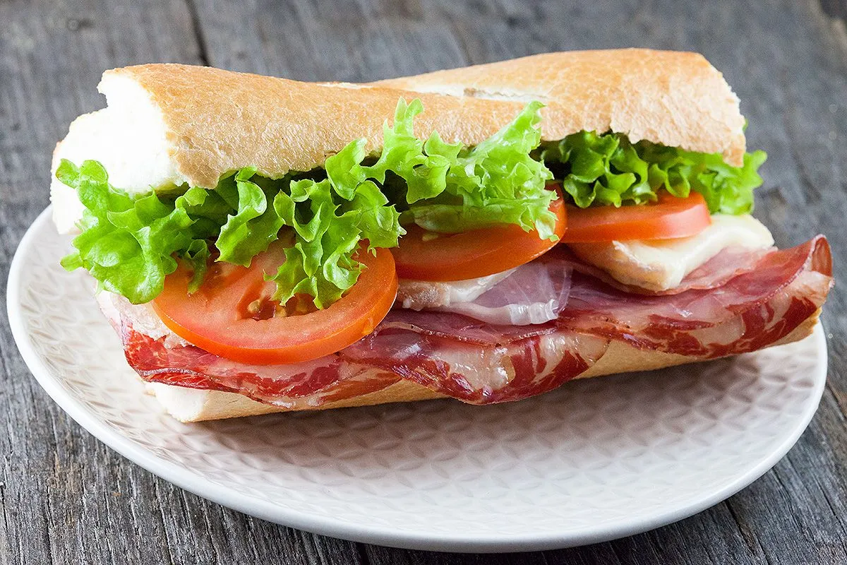 Toasted Italian sub with 3 different meats and melted cheese