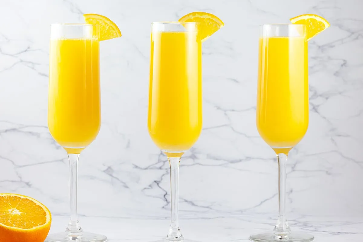 Mimosa cocktail with orange juice and champagne