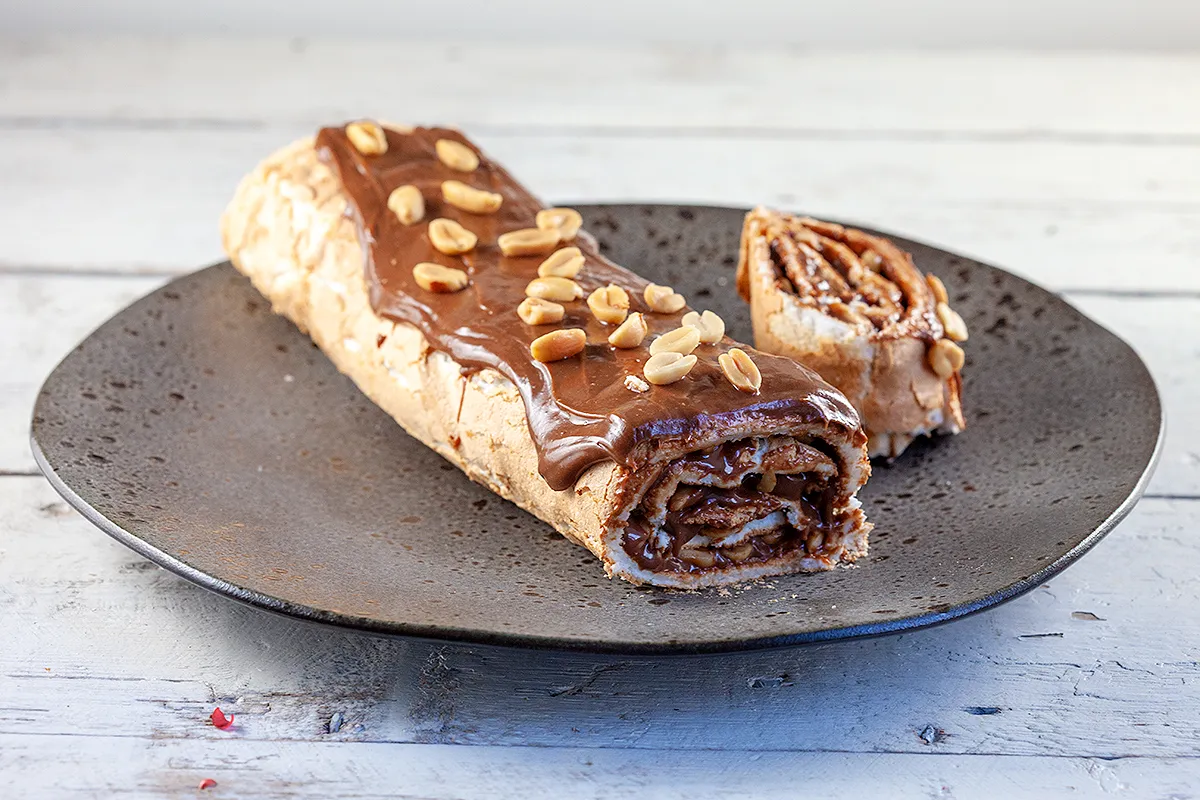 Peanut and chocolate meringue roll