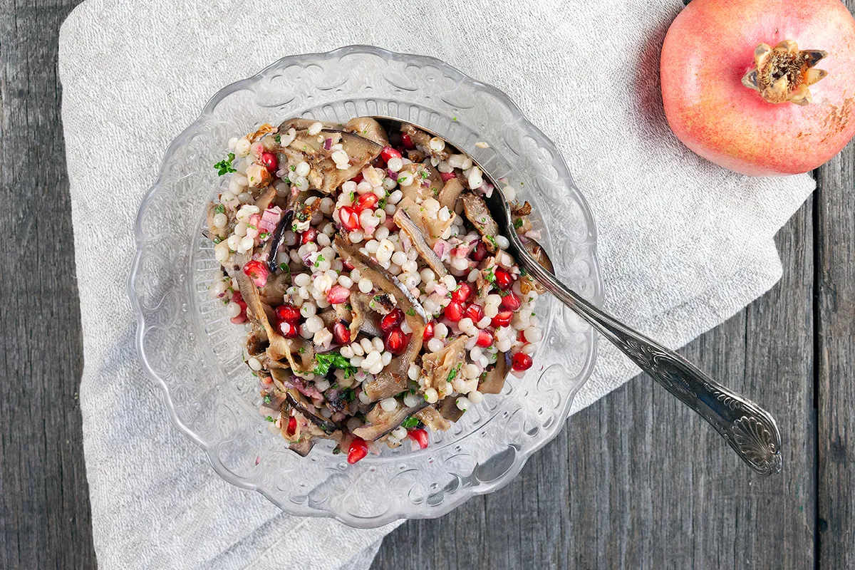 Pomegranate, eggplant and pearl couscous salad