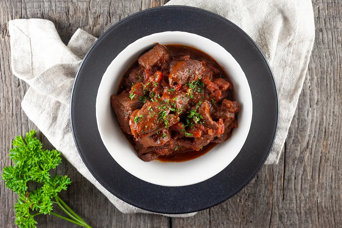 Beef sirloin in red wine sauce casserole