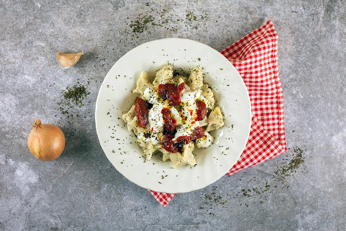 Turkish manti - small filled pasta in yogurt sauce