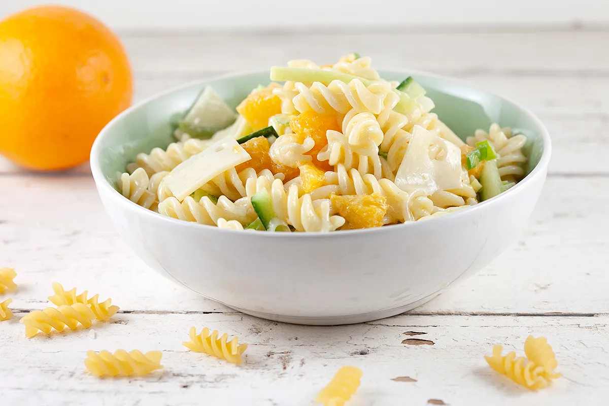 Pasta salad with orange and cheese