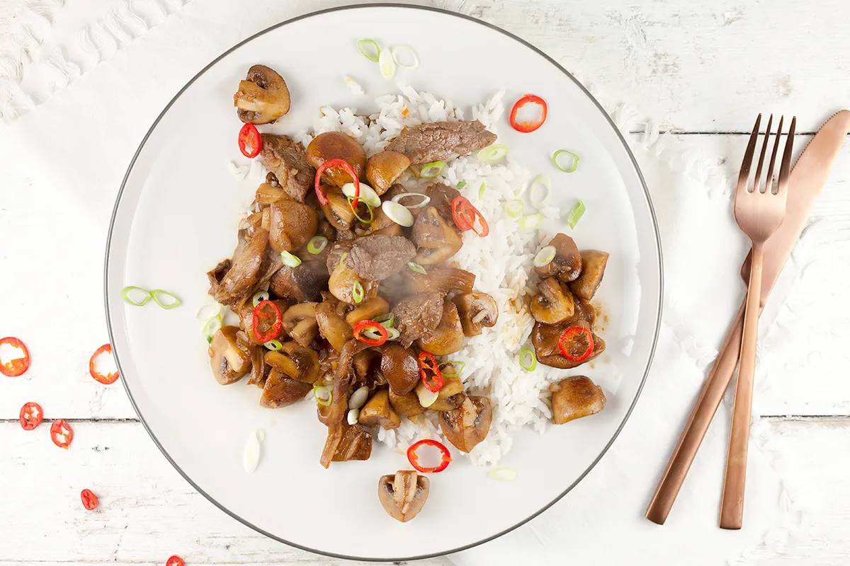 Rice with mushrooms, beef and soy sauce