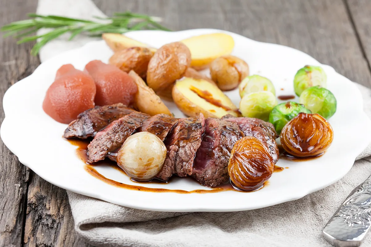 Kangaroo steak in syrup sauce