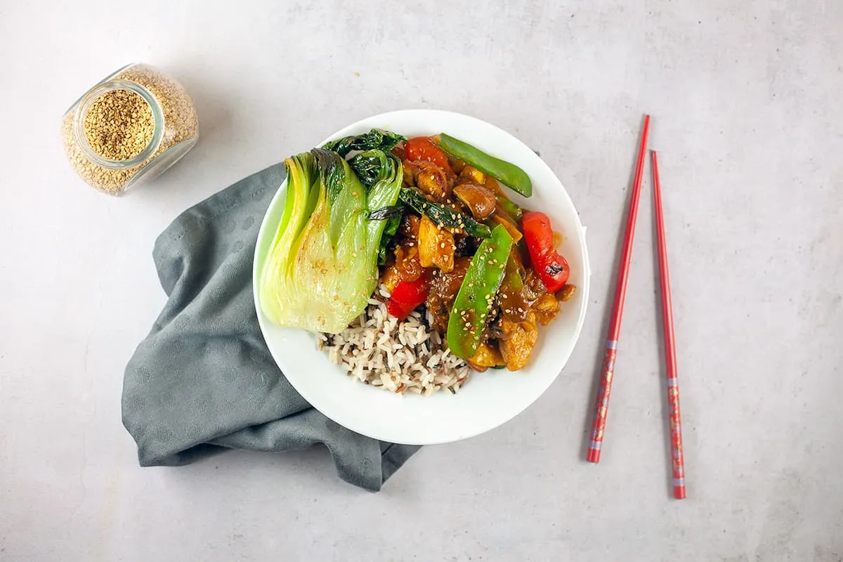 Sweet and sour chicken with bok choy and mango