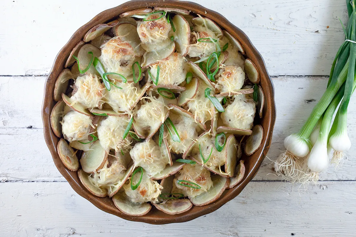 Oven baked meatballs, potatoes and bechamel sauce