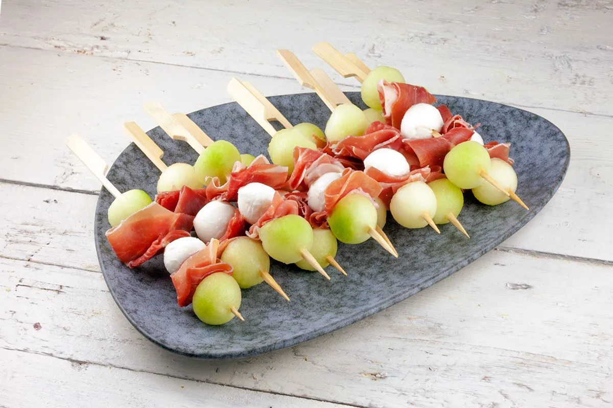 Melon, mozzarella and prosciutto skewers