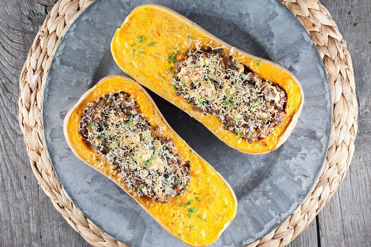 Roasted butternut squash filled with lentils and feta