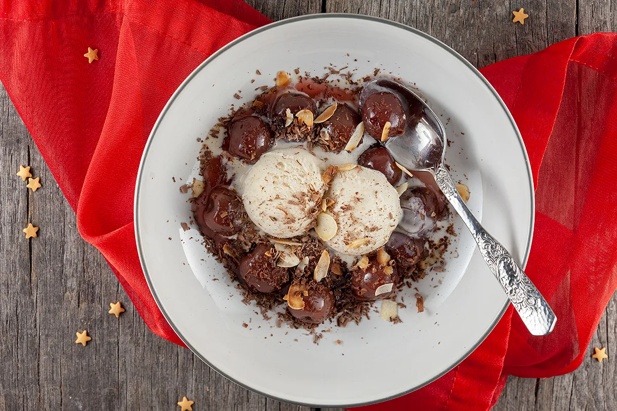 Warm cherries with vanilla ice cream