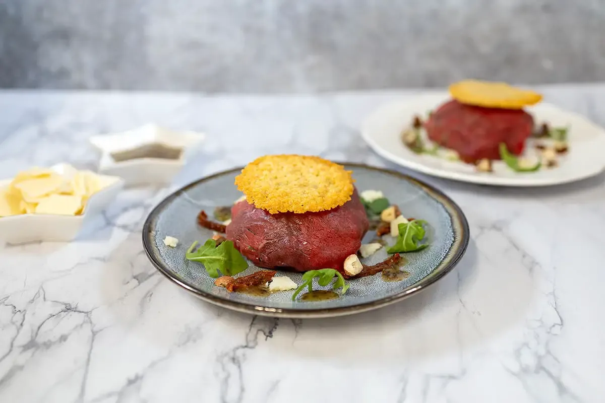 Carpaccio parcels with truffle dressing
