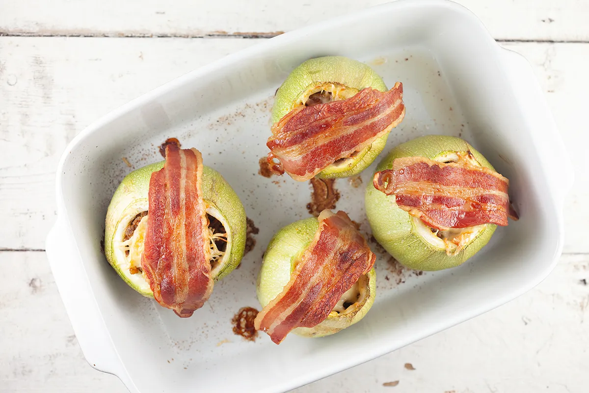 Beef stuffed zucchini with cheese and bacon