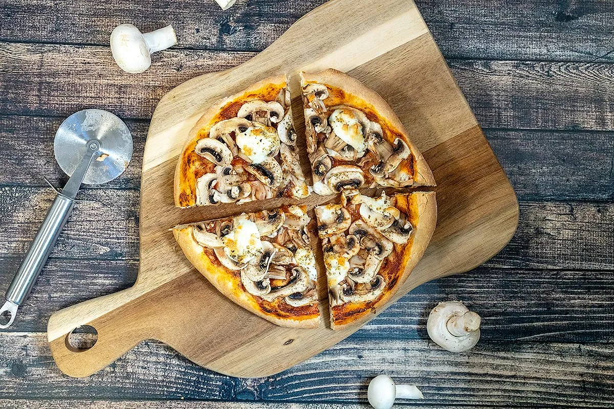 Pizza funghi (mushroom pizza) with loads of mushrooms