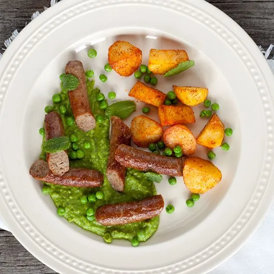 Recipe: Lamb sausages with minted pea puree