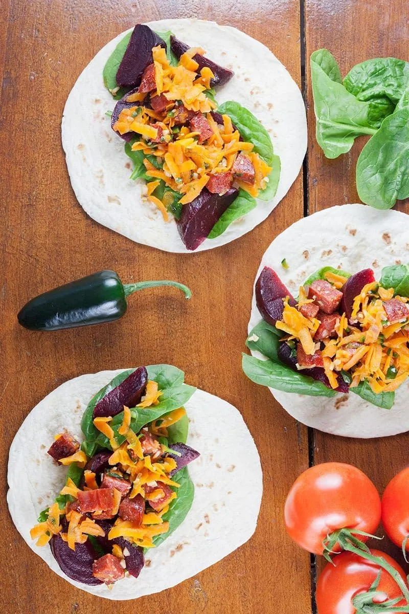 Pickled red beets and chorizo tacos