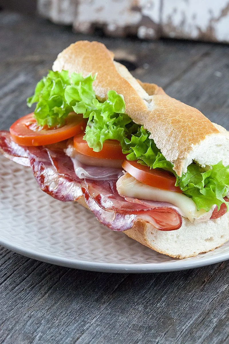 Toasted Italian sub with 3 different meats and melted cheese
