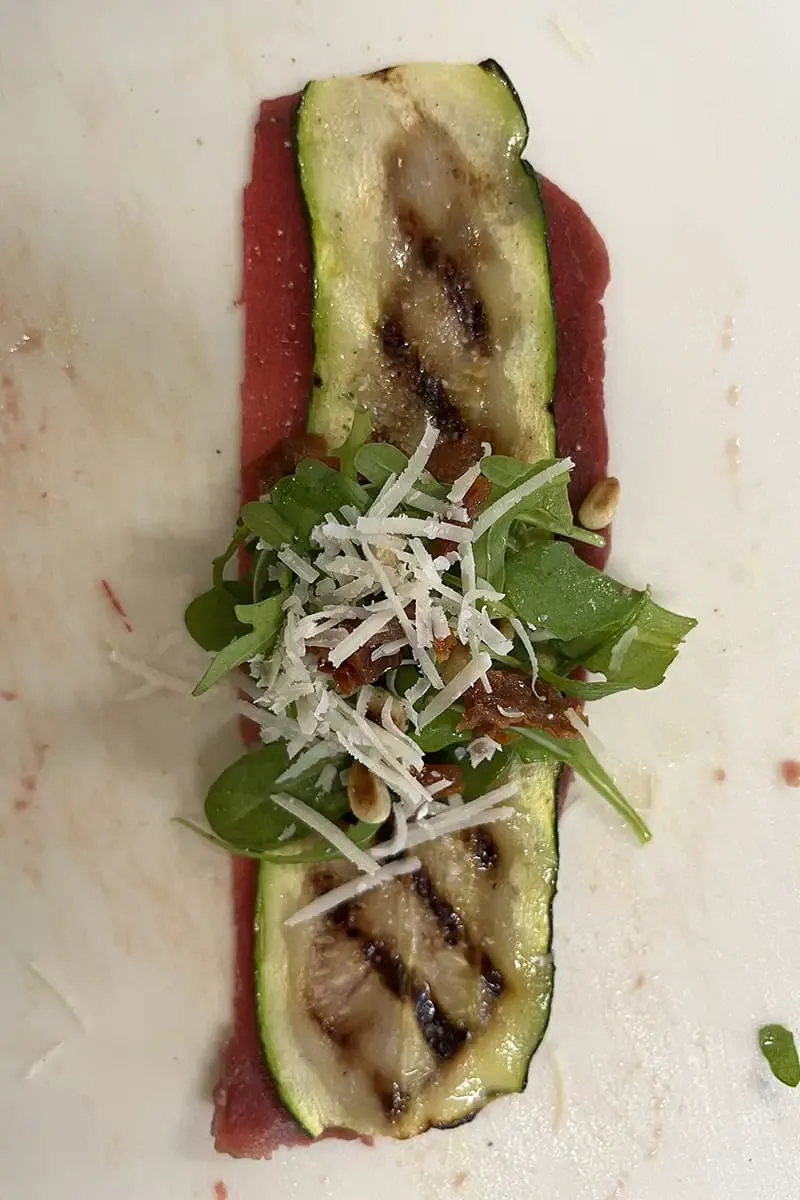 Preparing carpaccio rolls