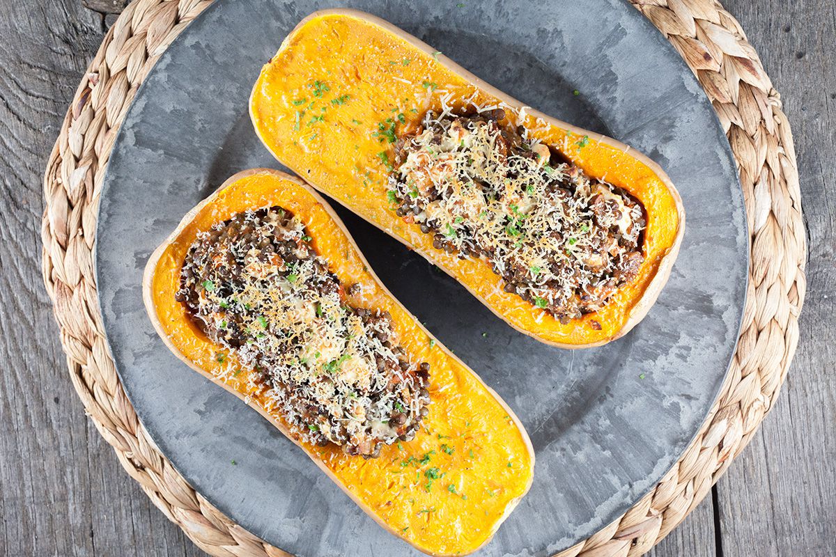 Roasted butternut squash filled with lentils and feta