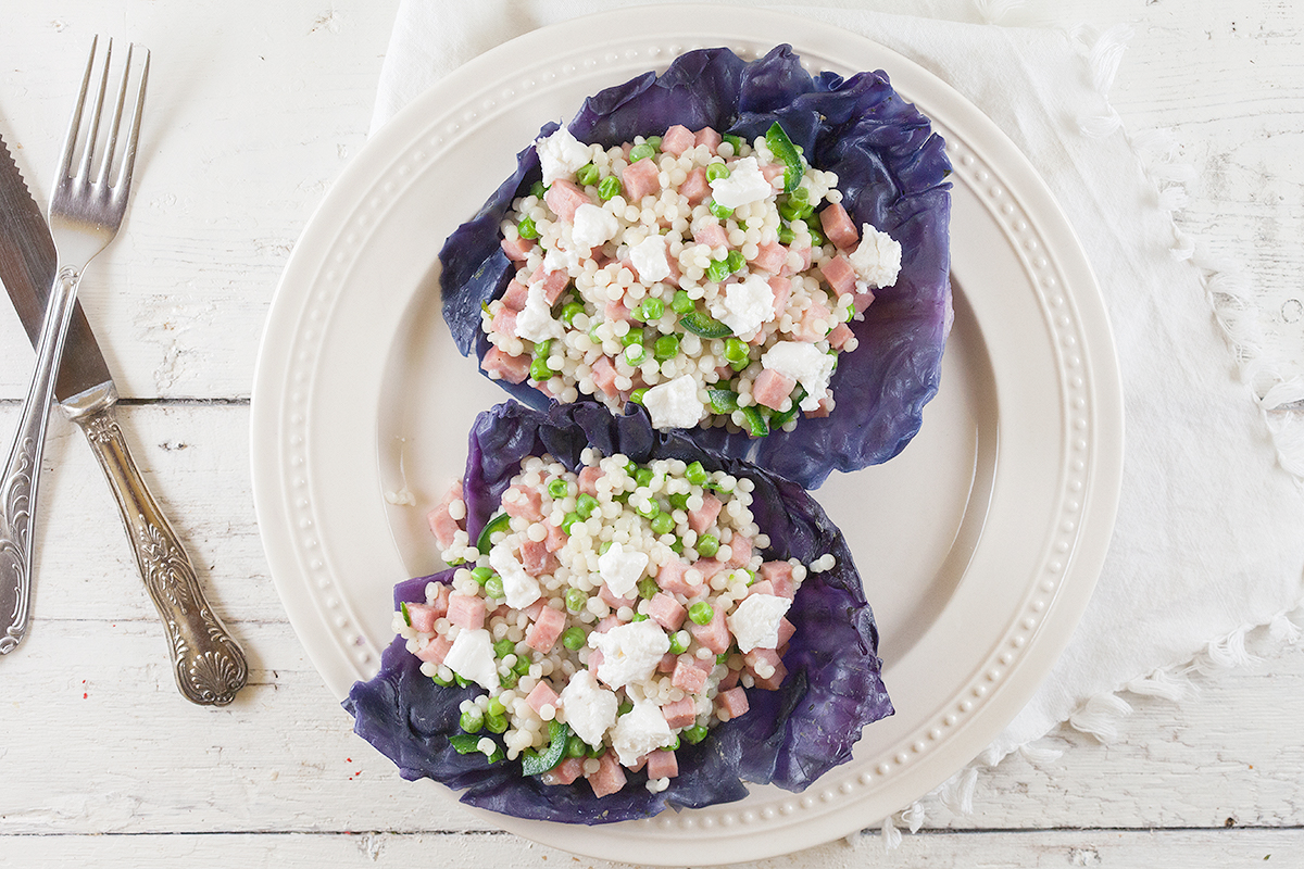 Red cabbage bowl with pearl couscous and goat's cheese